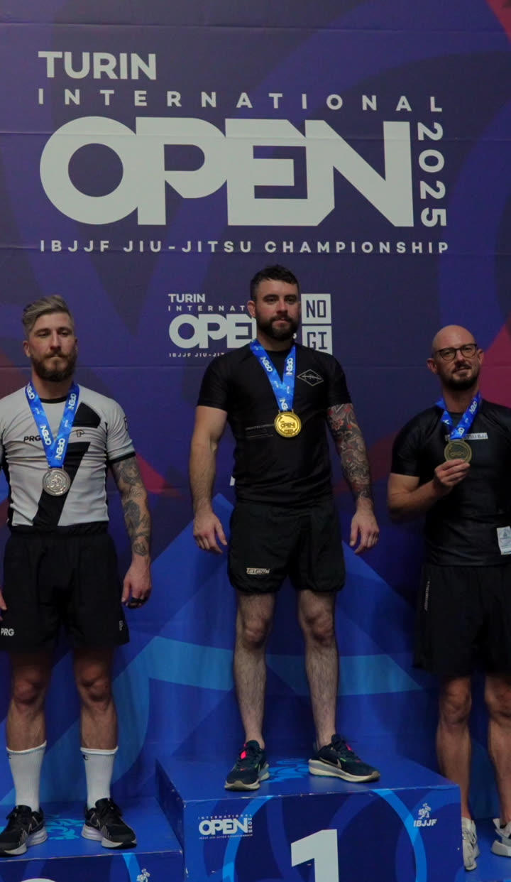 William Setz-Dempsey, head instructor, on the top step of the podium with a gold medal at the IBJJF Turin International Open 2025